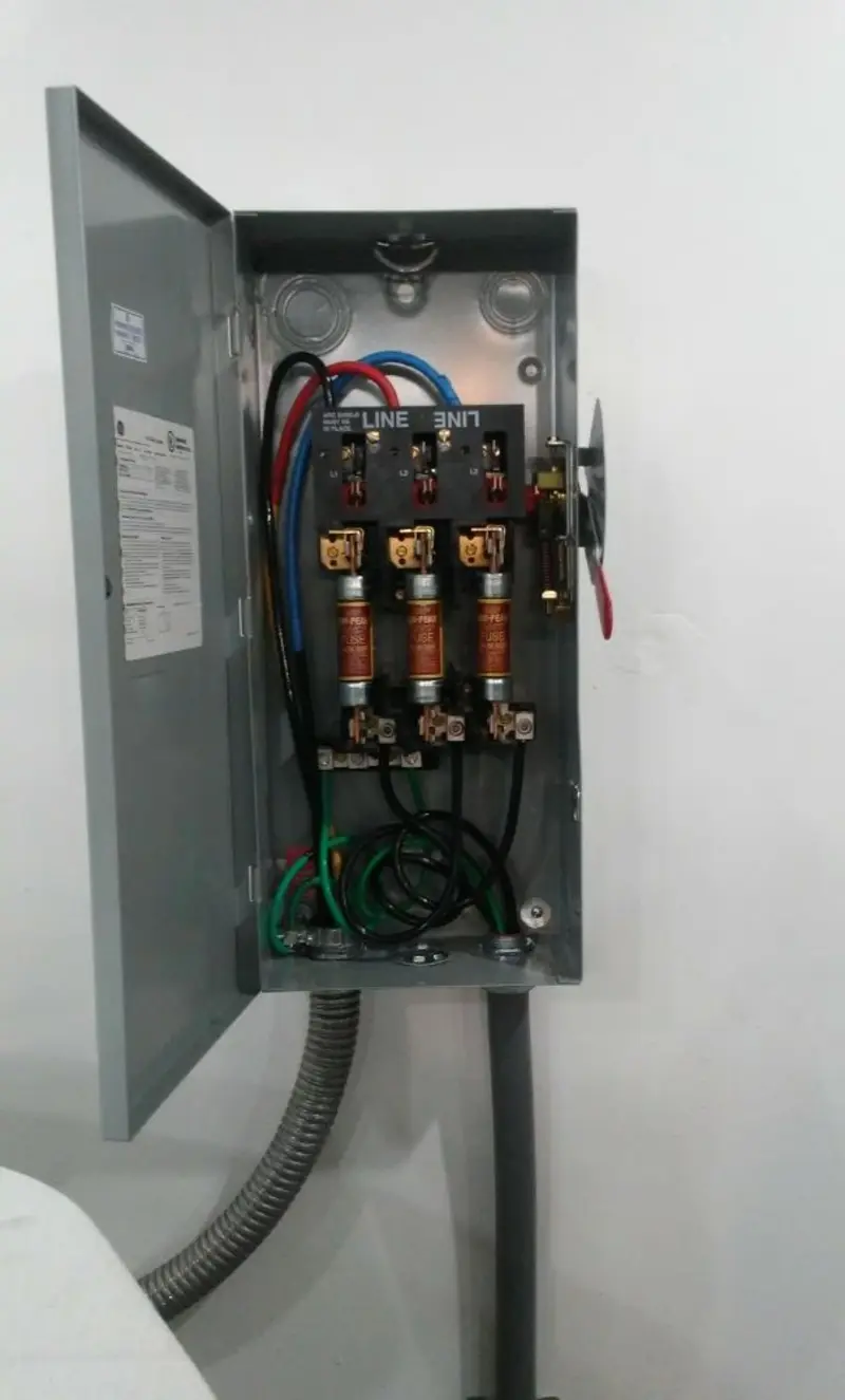 Three-phase disconnect switch installed for Smoke Detector Installation in Oak Island